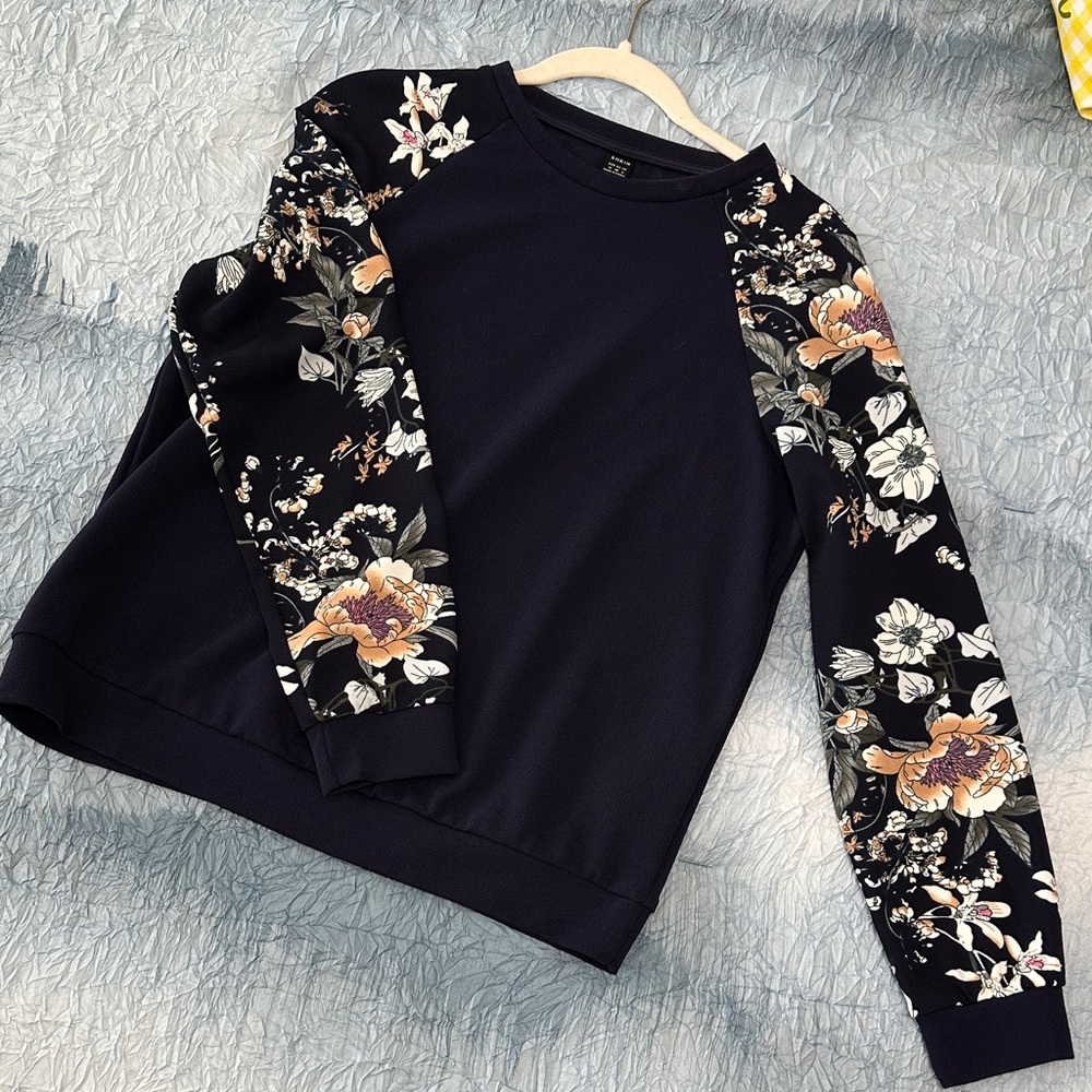 2. Floral Sleeve Navy Sweatshirt